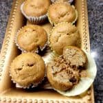 Banana cakes in a brown tray on the kitchen slab.
