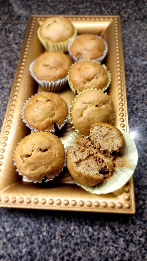 Banana cakes in a brown tray on the kitchen slab.