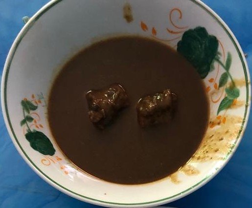 Itoko in a white dish on a blue background.