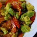 Avocat salad in a white bowl.