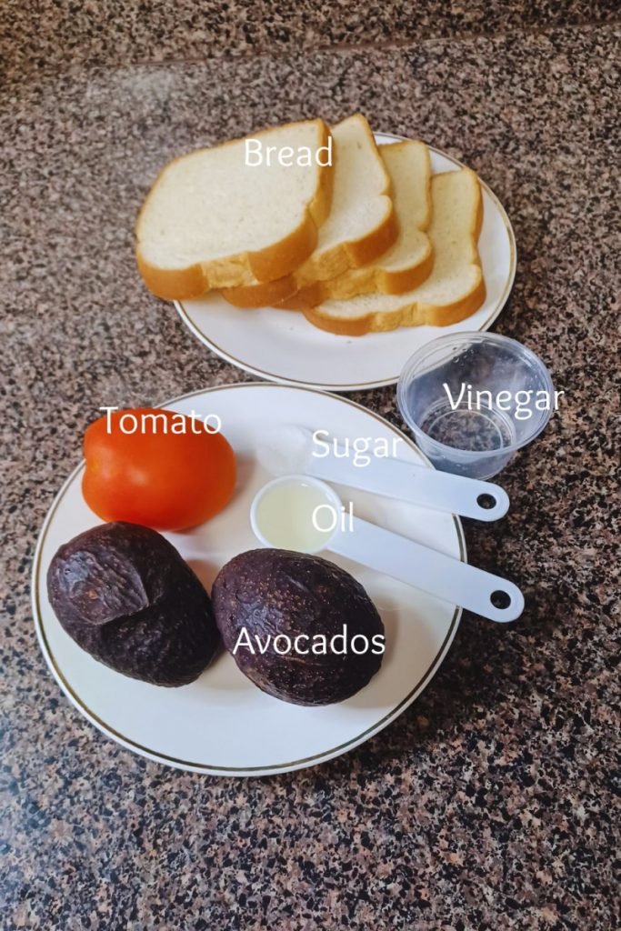 Avocat salad ingredients on a gray kitchen slab. 